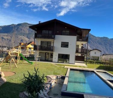 Lana Apartment | Discover Malojerhof: Oceanfront Paradise with Pool Access