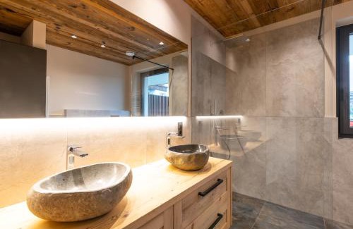 Lana Apartment | Discover Malojerhof: Oceanfront Paradise with Pool Access