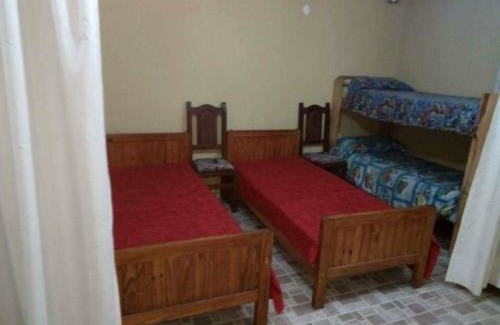 Villa Carlos Paz House | Malvina Hotel: Oceanfront Retreat with Pool & Pet-Friendly