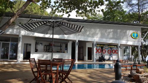 Pantai Barat Division Resort | Beautiful Mamutik Island Resort with Oceanfront Views