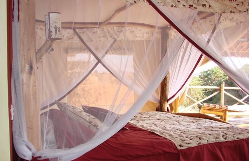 Tsavo Cabin | Explore Man Eaters Lodge: Relaxing Spa & Family-Friendly Fun