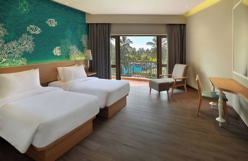 Pineleng Hotel | Discover Manado Tateli Resort with Pool & Family Amenities