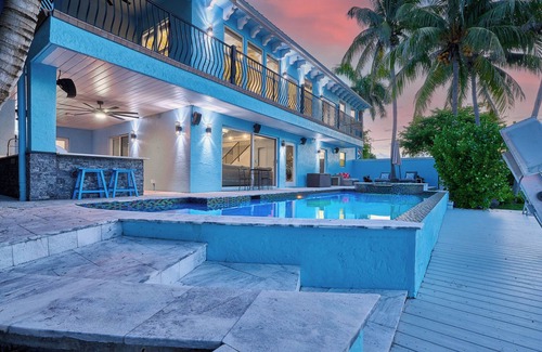Hypoluxo House | Escape to Manatee Way: Poolside Retreat with Ocean Views