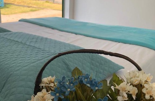 Chapada dos Guimaraes Hotel | Discover Mandala Pousada Container: Family-Friendly Retreat