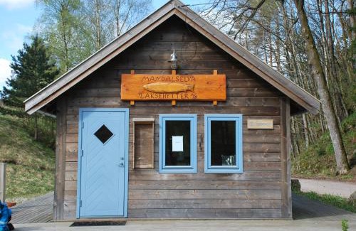 Oyslebo Cabin | Discover Mandalselva Laksehytter: Family & Pet Friendly Retreat
