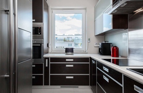 Fabryczna Apartment | Stylish Two-Level Apartment with Terrace and Parking