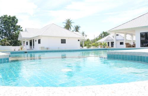 Huai Yang Resort | Beachfront Mango Beach Resort Thailand: Family-Friendly Retreat