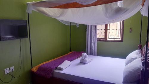 Boma la Ngombe Cabin | Mango Lodge