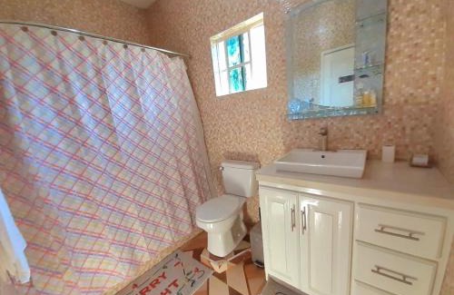 Treasure Beach Villa | Discover Mango Tree Oasis: Pet & Child Friendly Retreat
