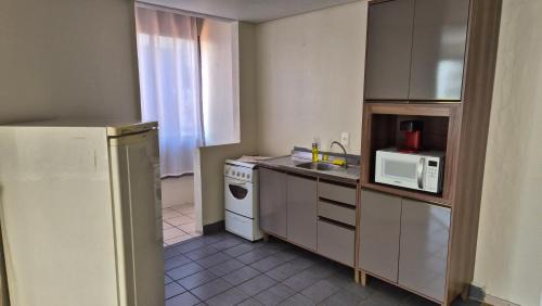 Bom Fim Apartment | Cozy Manhattan Apart Hotel: Family-Friendly with a Pool