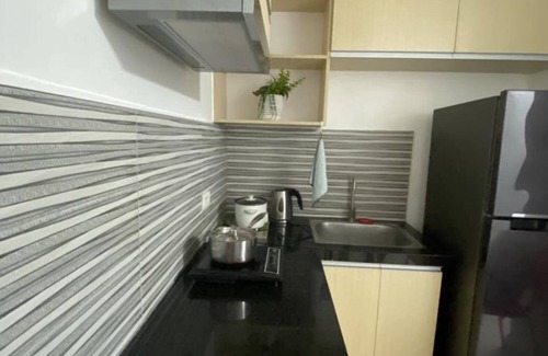 Barangay 670 Apartment | Discover Manila Deluxe Room with Balcony & Pool Access
