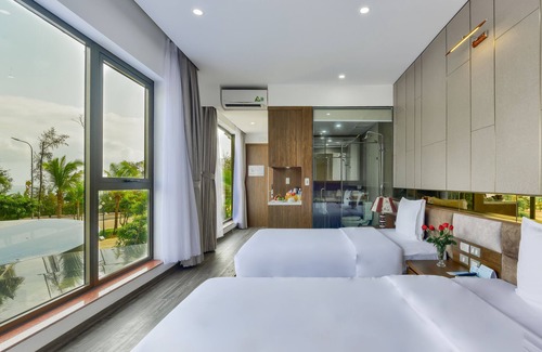 Dong Hoi Hotel | Relax at Manli Resort Quang Binh with Pool & Family Amenities