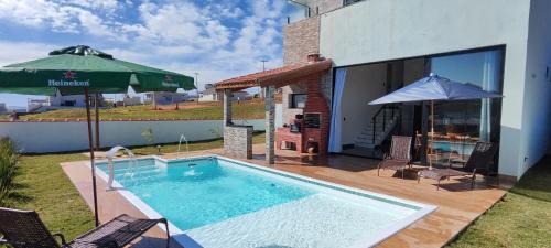 Paranapanema House | Experience Manoa - Casa na Represa with Oceanfront Bliss