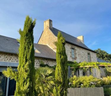 Val-d'Ize Bed & Breakfast | Experience Manoir de la Nogrie with Oceanfront Access & Pool