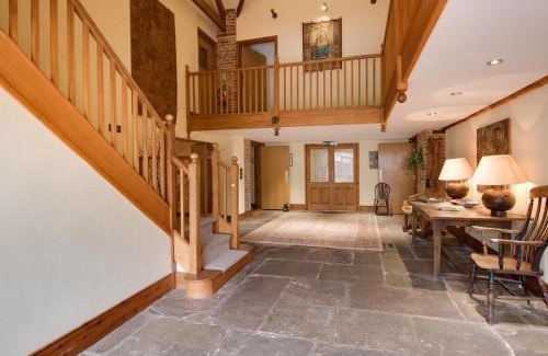 Cheselbourne House | Discover Manor Farm Barn: Pet-Friendly Retreat with Pool