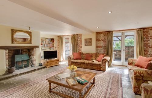 Cheselbourne House | Discover Manor Farm Barn: Pet-Friendly Retreat with Pool