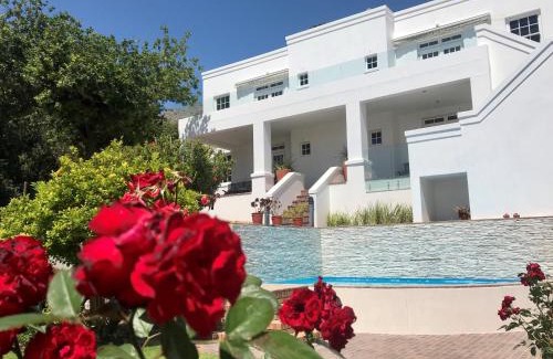 Gordons Bay Central House | Oceanfront Retreat: Manor on the Bay with Pool & Dining