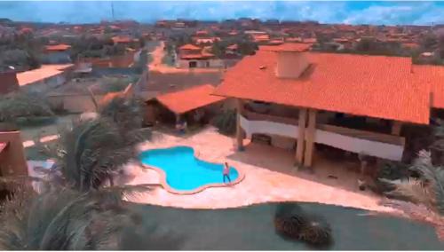 Porto das Dunas House | Mansão Memphis: 10 Suites Steps from the Beach & Park