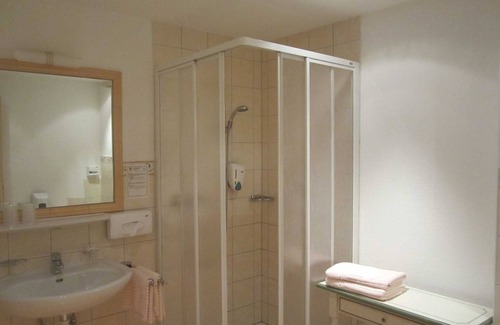 Niederau Hotel | Inviting Mansard Junior Suite at Hotel Schneeberger