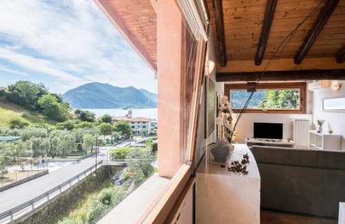 Sulzano Apartment | Lake View Loft with Hot Tub and Family-Friendly Amenities