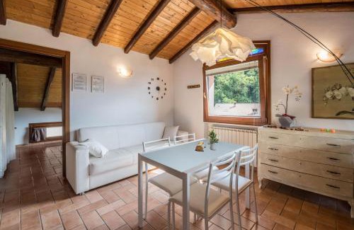 Sulzano Apartment | Lake View Loft with Hot Tub and Family-Friendly Amenities