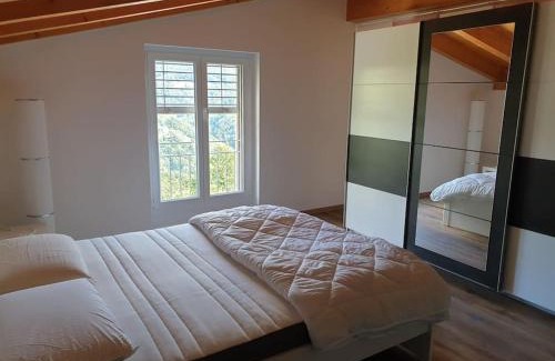 Valcolla Apartment | Stylish Mansarda Loft: Perfect for Families and Relaxation