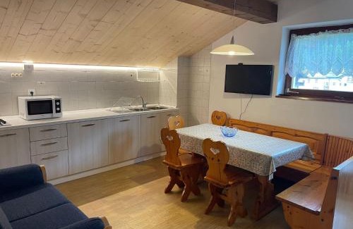 Falcade Apartment | Family-Friendly Escape at Mansarda Mulaz for Memorable Stays