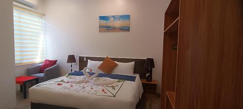 Dharavandhoo Bed & Breakfast | Discover Manta Sky Inn: Oceanfront Bliss Awaits You