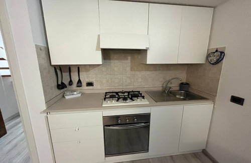 Domodossola Apartment | Cozy Mantellini 2B Apartment with Kitchen and Breakfast