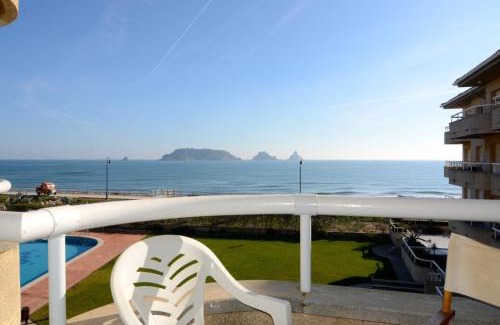 Els Griells Apartment | Oceanfront Comfort at MANUREVA III 2-C - Pet Friendly Stay
