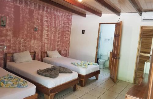 Paquera Hotel | Explore Mapi's Cabins: Family-Friendly Retreat with Pool