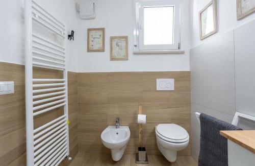 Ferro di Cavallo Apartment | MaRì Studio Flat - Posto auto e Metro - ItalyWeGo