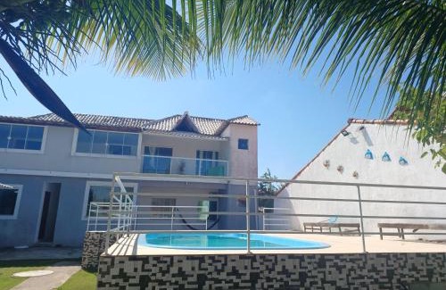 Coqueiral House | Discover Mar e Sol de Araruama: Oceanfront Retreat Awaits