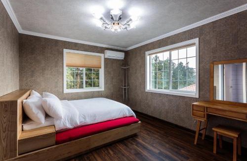 Jungmun House | Family-Friendly Retreat at Mar En Luz - 4-Star Comfort