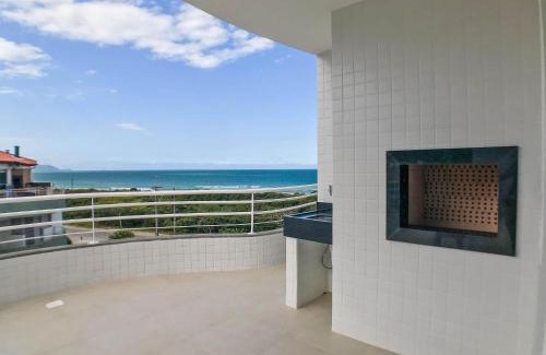 Ingleses Norte Apartment | Elegant Oceanfront Retreat with Spectacular Sea Views