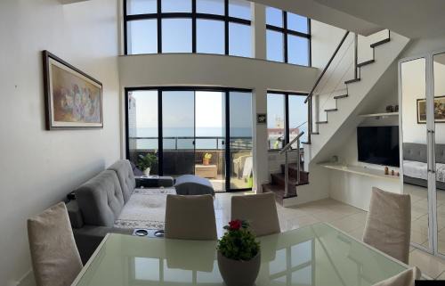 Salvador Apartment | Oceanfront Duplex with Breathtaking Views and Spa Access
