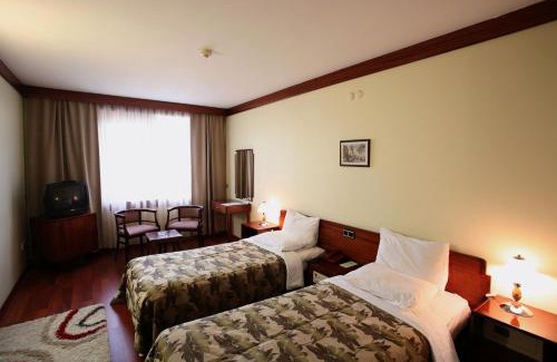 Taksim Hotel | Elegant Marble Hotel: Family-Friendly with Spa & Pool Access