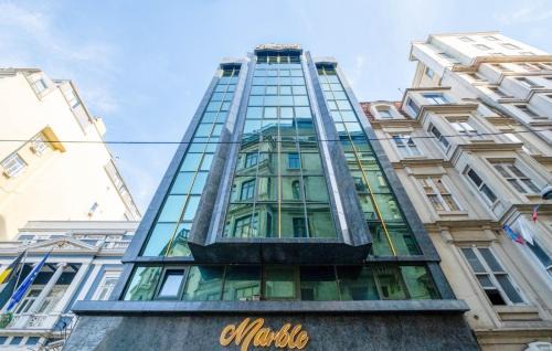Taksim Hotel | Elegant Marble Hotel: Family-Friendly with Spa & Pool Access