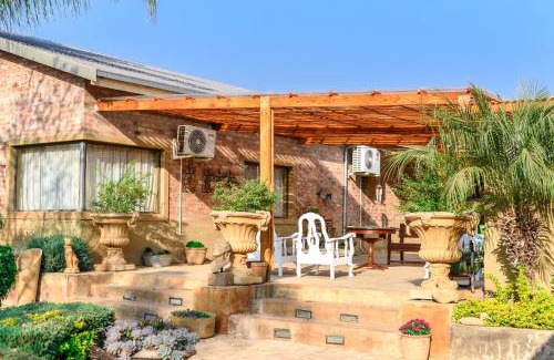 Mooinooi House | Discover Maretlwane Guesthouse: Rated 9/10 with Pool Access