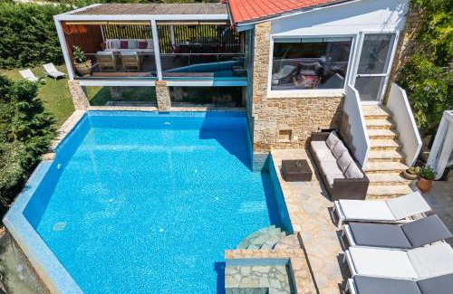 Elia Villa | Relax at Maria Elena Villas II with Oceanfront Views