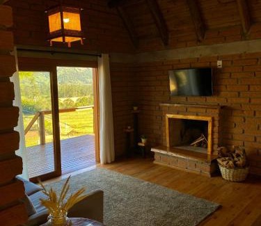 Praia Grande Cabin | Experience Comfort at Maria Rita dos Canyons - 9.5/10 Rating