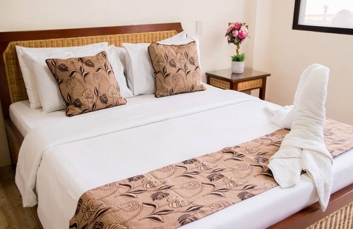 Carmen Hotel | Cozy Marick Beach Resort with Pool and Family Amenities