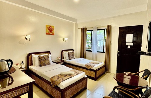 Carmen Hotel | Cozy Marick Beach Resort with Pool and Family Amenities