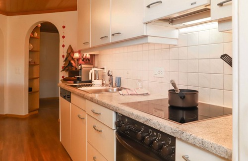 Saanen Apartment | Relaxing Lake View Retreat at Marie-Soleil Est by Interhome