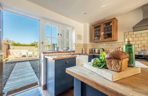 Docking Cottage | Idyllic Marigold Cottage in Docking with Oceanfront Views