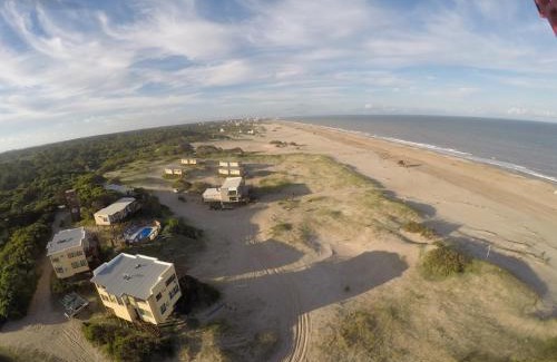Villa Gesell Apartment | Beachfront Bliss at Marina de las Pampas - 4 Star Retreat