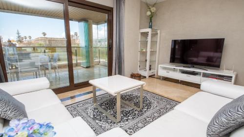 Castillo de Sabinillas Apartment | Discover Marina del Castillo 3110: Poolside Family Retreat