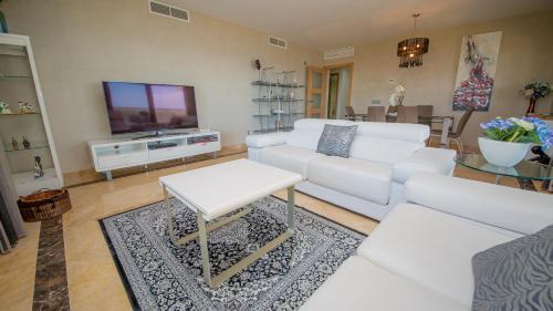 Castillo de Sabinillas Apartment | Discover Marina del Castillo 3110: Poolside Family Retreat