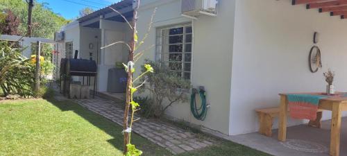 Balneario El Condor House | Discover Marina El Condor: Pet-Friendly Retreat with Hot Tub