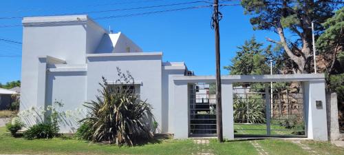 Balneario El Condor House | Discover Marina El Condor: Pet-Friendly Retreat with Hot Tub